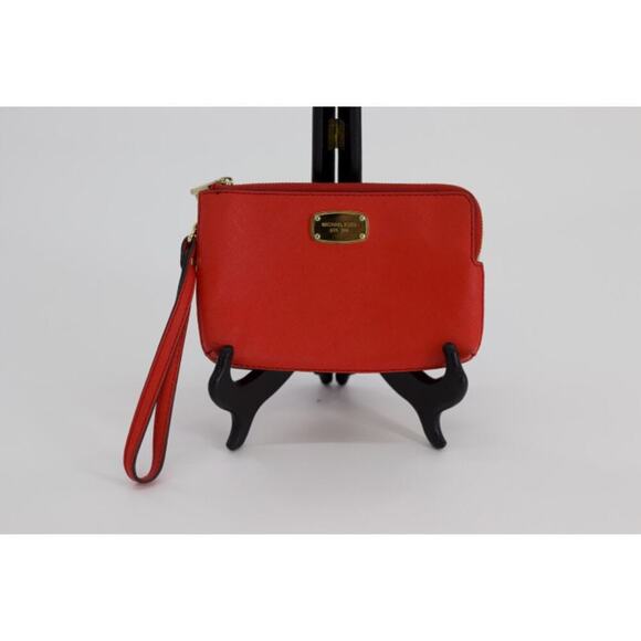 Michael Kors red leather wristlet. - Picture 1 of 11